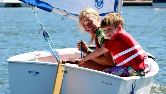 Kids on a sailboat